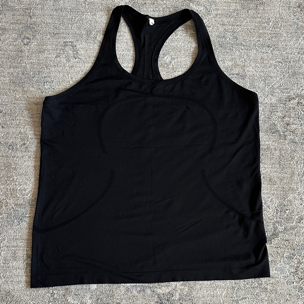 Lululemon women’s tank top
Size 16
Color:black